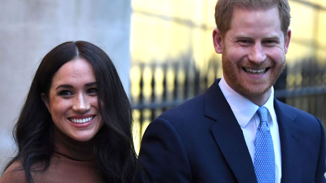 Britain&#039;s Prince Harry, Duke of Sussex and Meghan, Duchess of Sussex react as they leave after their visit to Canada House in thanks for the warm Canadian hospitality and support they received during their recent stay in Canada, in London on January 7, 2020.