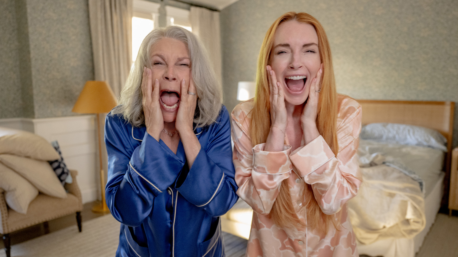 Jamie Lee Curtis as Tess Coleman and Lindsay Lohan as Anna Coleman in Freakier Friday.