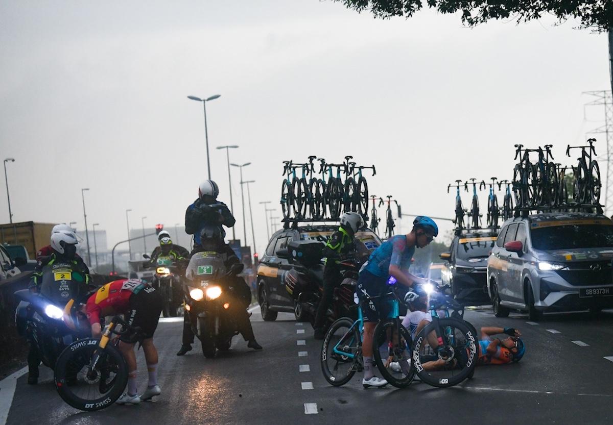 Matteo Malucelli (XDS-Astana) lies on the ground in the orange points jersey on stage 6 of Petronas Le Tour de Langkawi