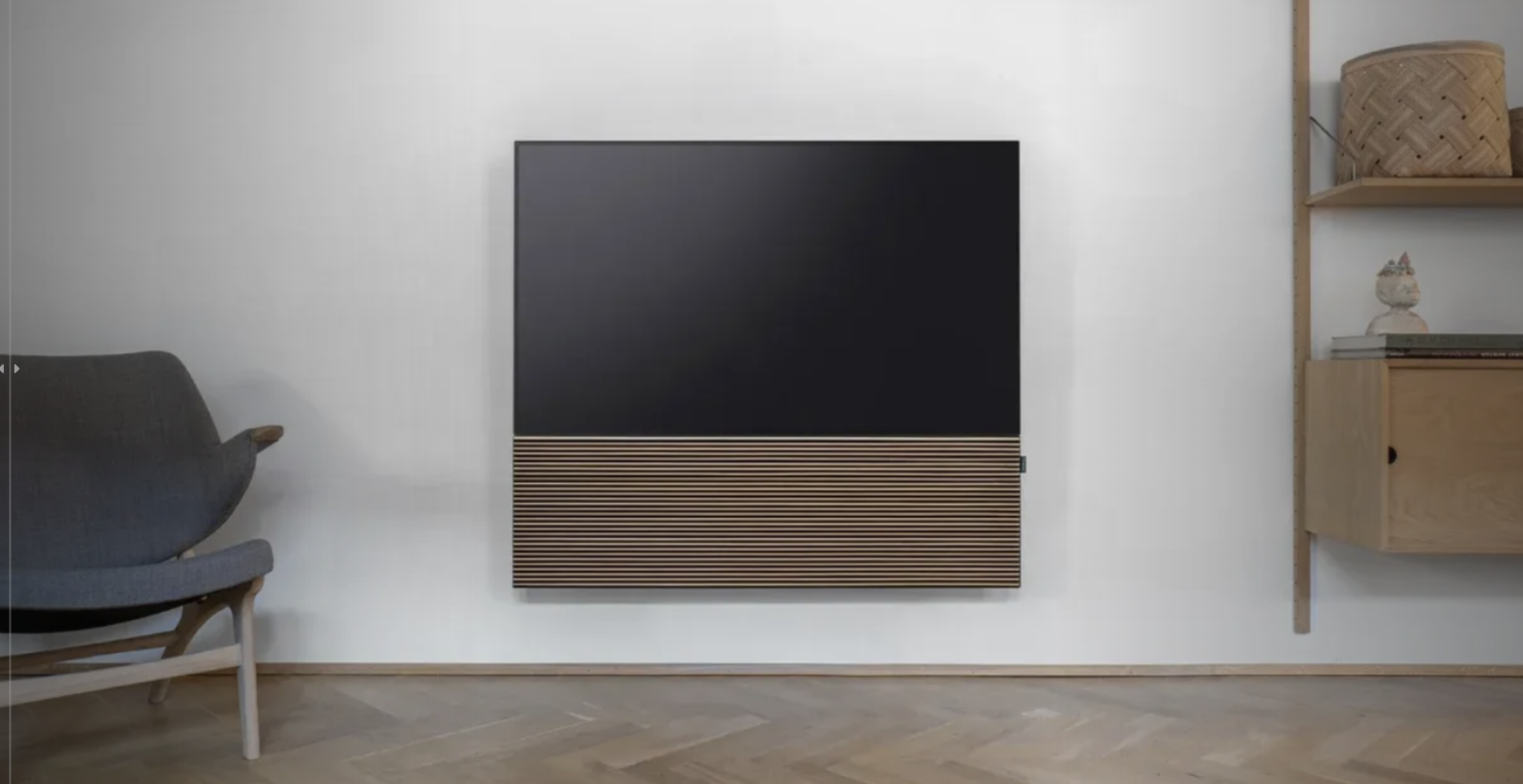 Canvas 65" speaker wall mounted under a TV