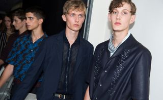 Males models wearing blue jackets and shirts from the Salvatore Ferragamo S/S 2018 collection