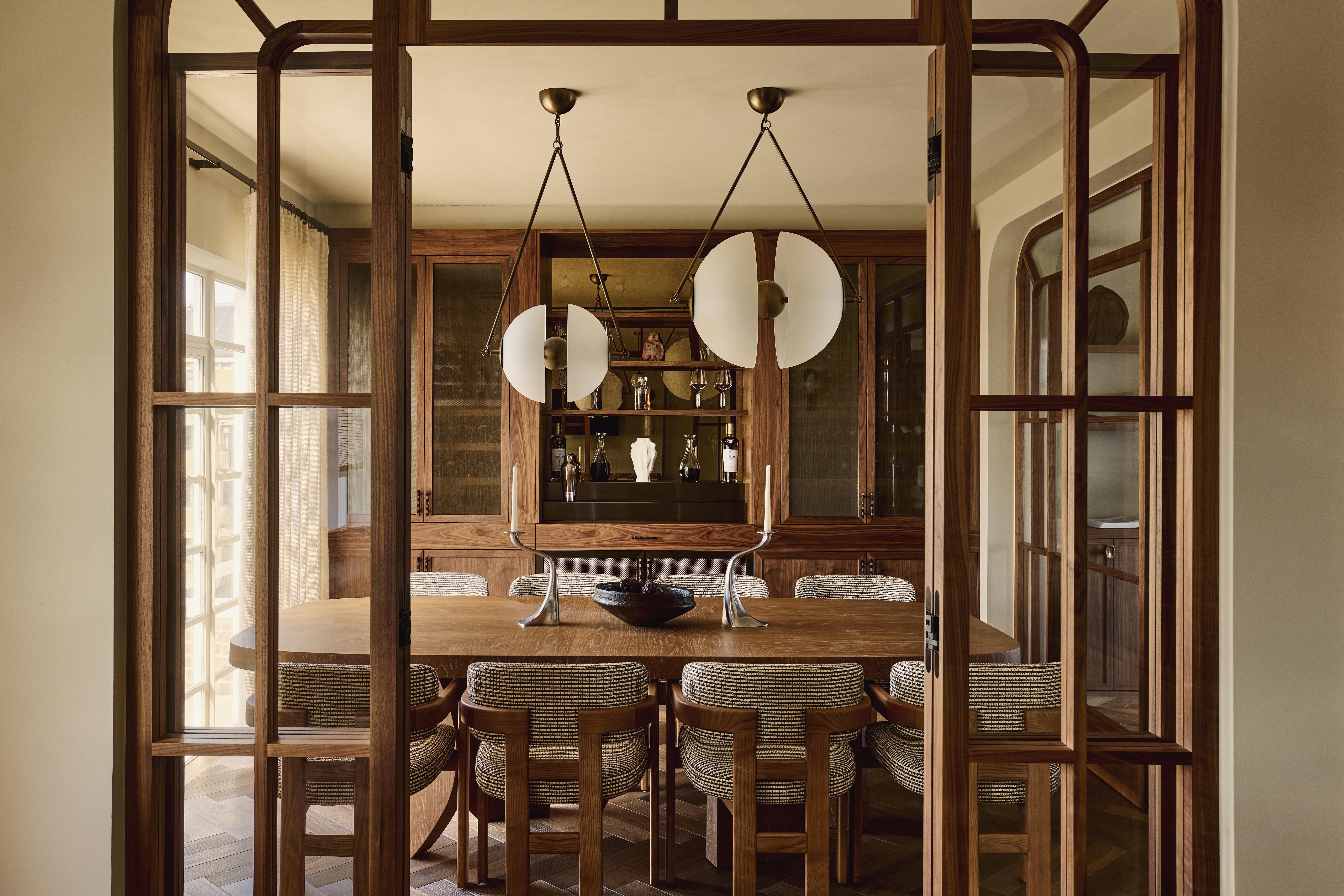 Dining area with wooden dining table and upholstered chairs