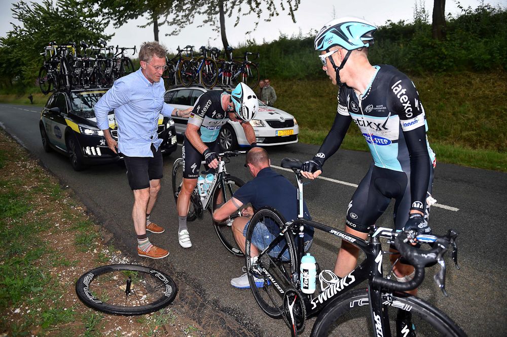 Mark Cavendish gets a wheel change during stage 5 of the 2015 Tour de France.