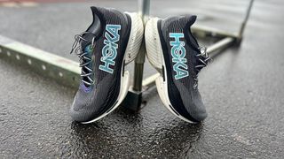 Hoka Cielo X1 running shoes stood up outside