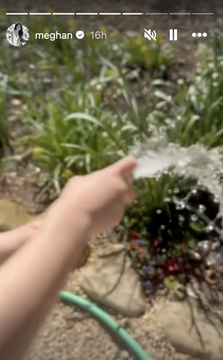 Prince Archie using a hose on Meghan's Instagram story