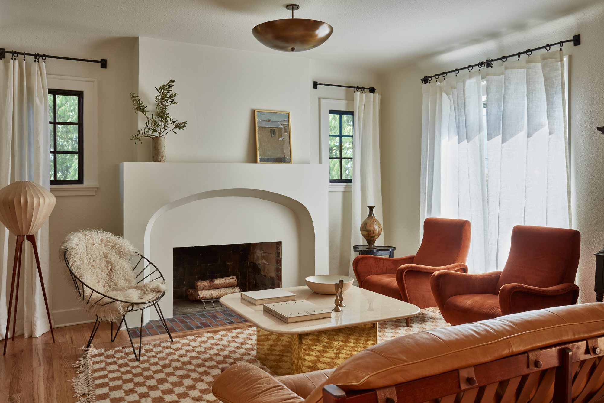 These rust living rooms have convinced me it's the color trend of 2023 ...