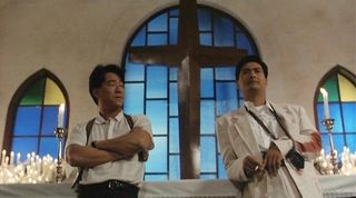 Police officer Li and hit man Ah Jong enjoy a peaceful moment in the church before the violence erupts in