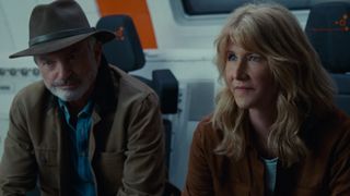 Doctor Alan Grant and Doctor Ellie Sattler share a moment in Jurassic World Dominion