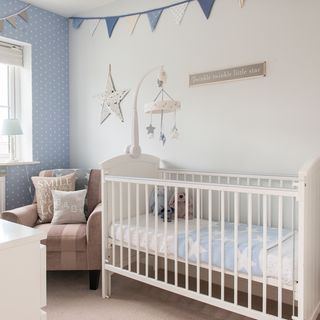 childs room with toddler bed and cot