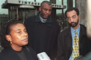 Neville and Doreen Lawrence, the parents of murdered teenager Stephen Lawrence, with their solicitor Imran Khan in 1999