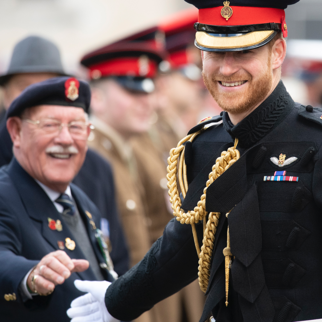 Prince Harry greets military veteran