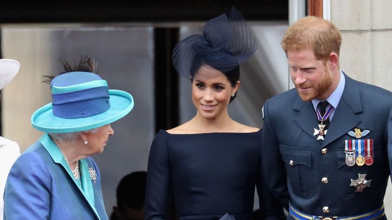 london, england july 10 l r queen elizabeth ii, meghan, duchess of sussex, prince harry, duke of sussex watch the raf flypast on the balcony of buckingham palace, as members of the royal family attend events to mark the centenary of the raf on july 10, 2018 in london, england photo by chris jacksongetty images