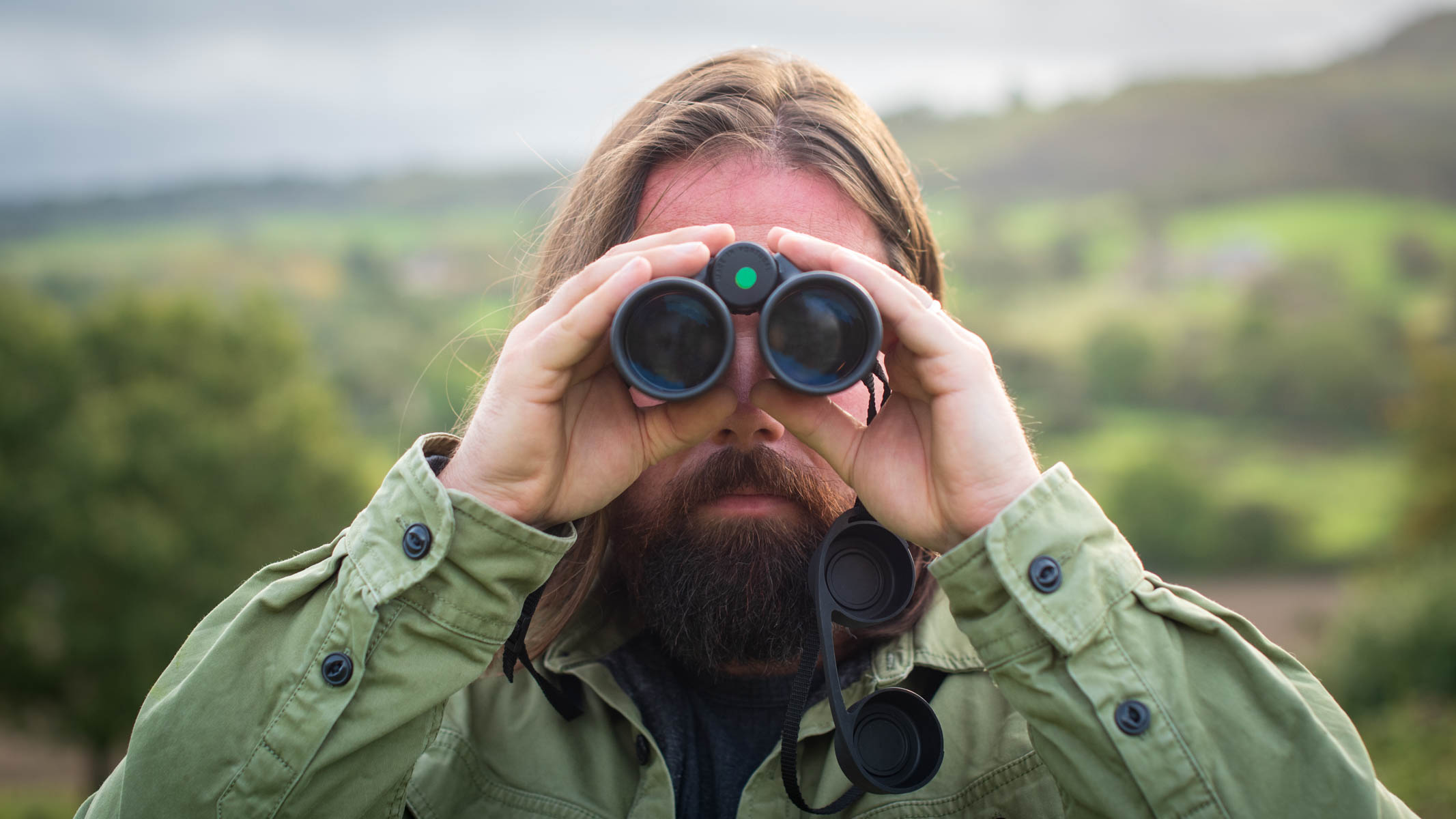 Person observing with Leica trinovid