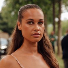 model wearing cream bronzer