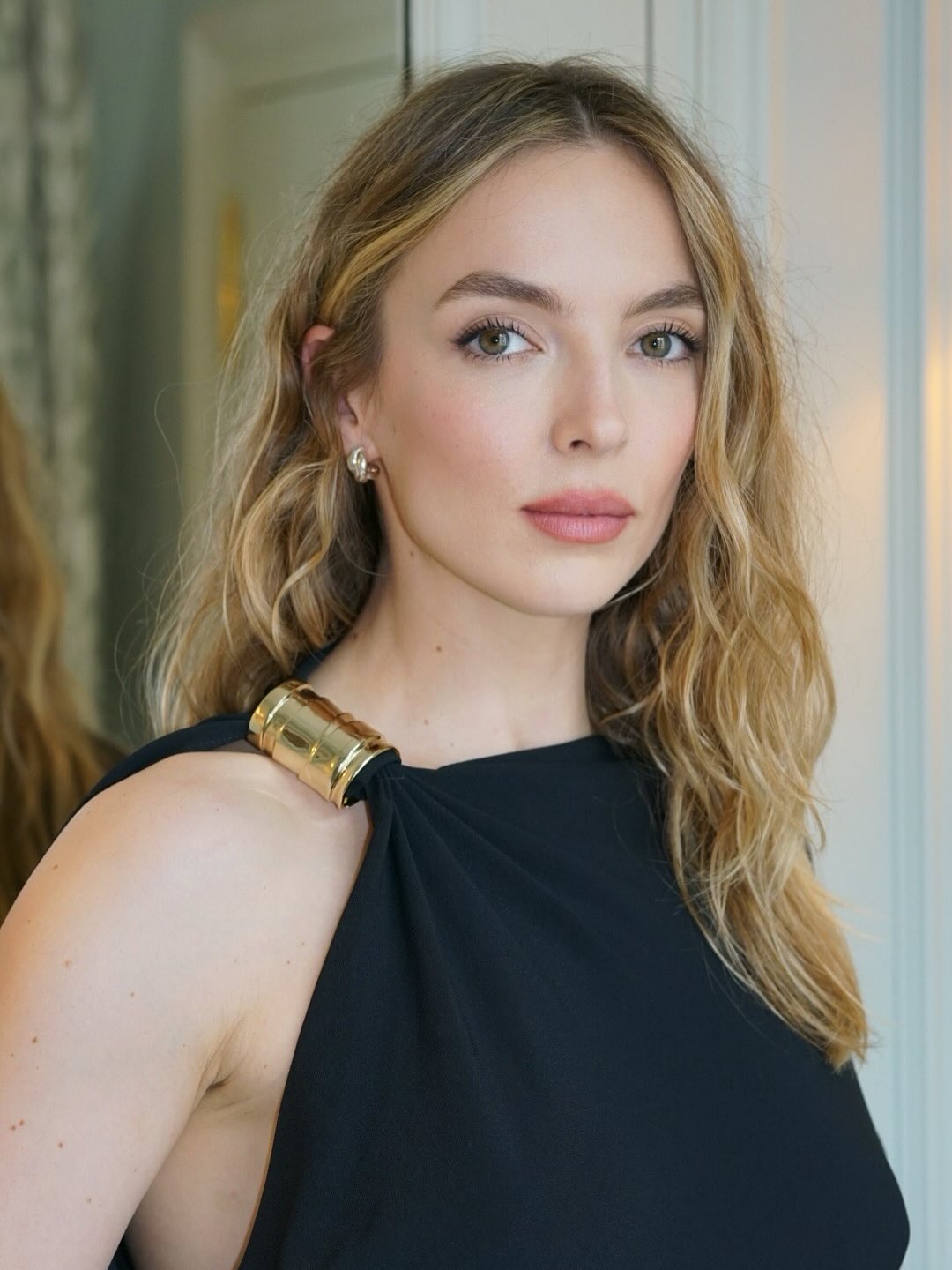 Jodie Comer with folklore blonde