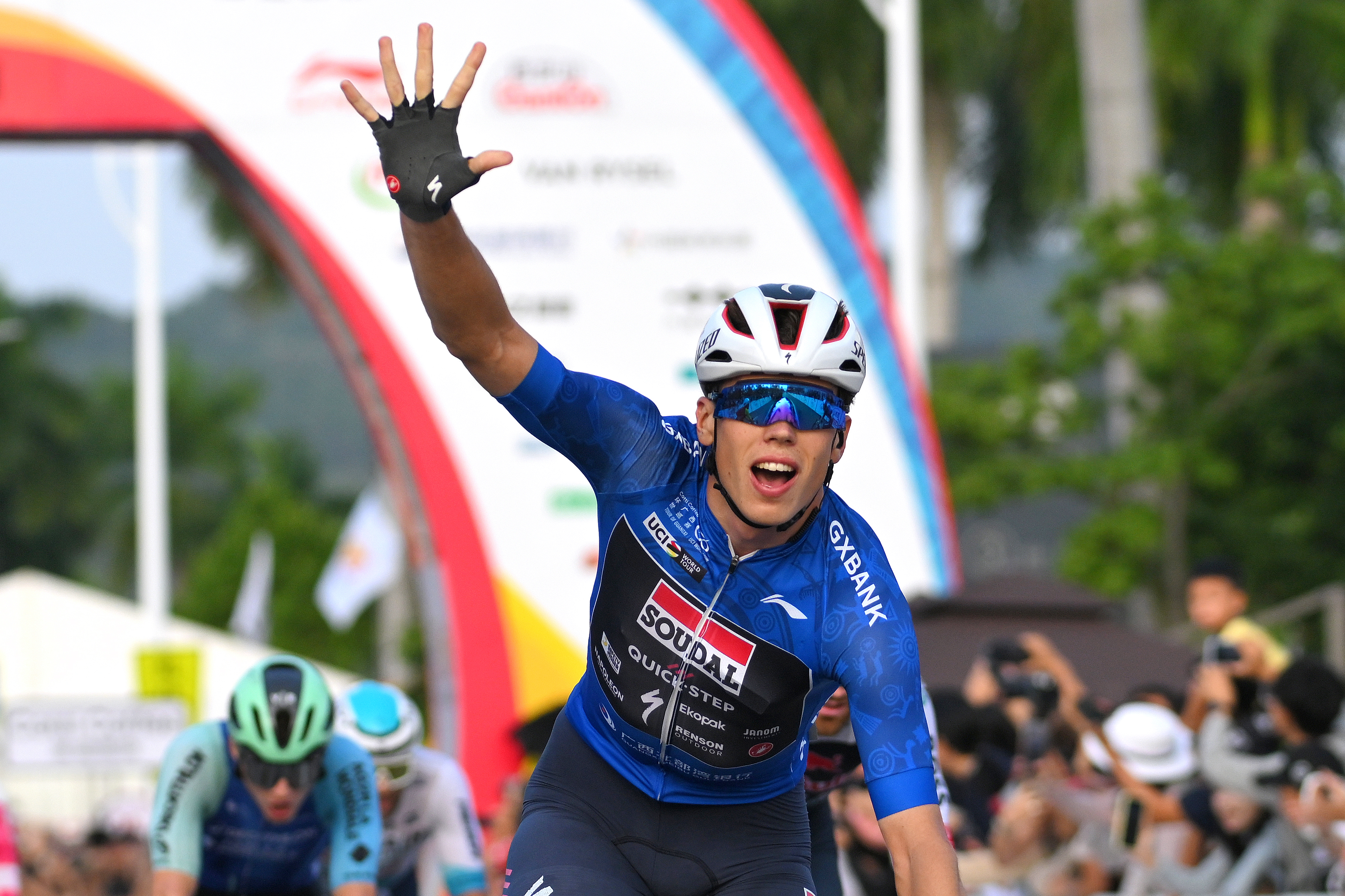 NANNING, CHINA - OCTOBER 19: Paul Magnier of France and Team Soudal Quick-Step - Blue Points Jersey celebrates at finish line as stage winner during the 6th Gree-Tour Of Guangxi 2025, Stage 6 a 134.3km stage from Nanning to Nanning / #UCIWT / on October 19, 2025 in Nanning, China. (Photo by Tim de Waele/Getty Images)
