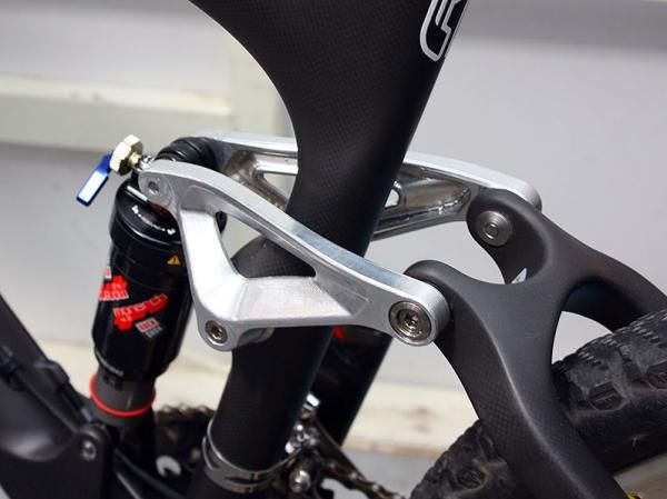 The upper links on this prototype were CNC machined but ultimately, the production rig will use stiffer and stronger forged bits. Titanium and aluminum hardware is used throughout.