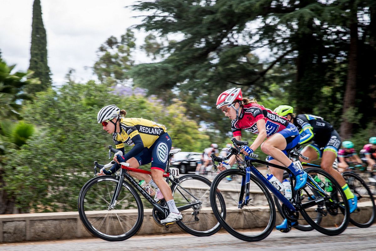 Amber Neben riding aggressively at the head of the peloton