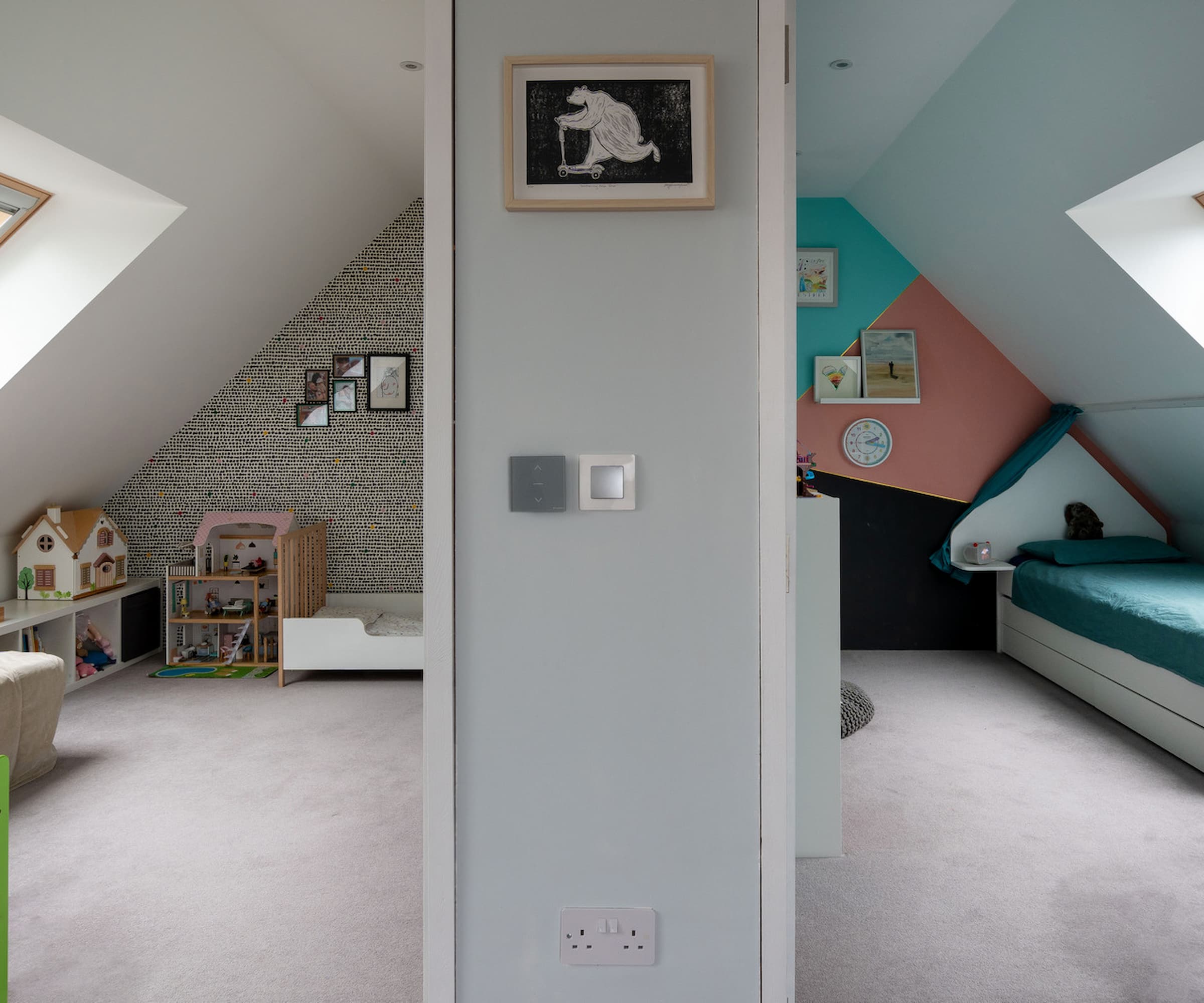 Two children's bedrooms side-by-side with vaulted ceilings