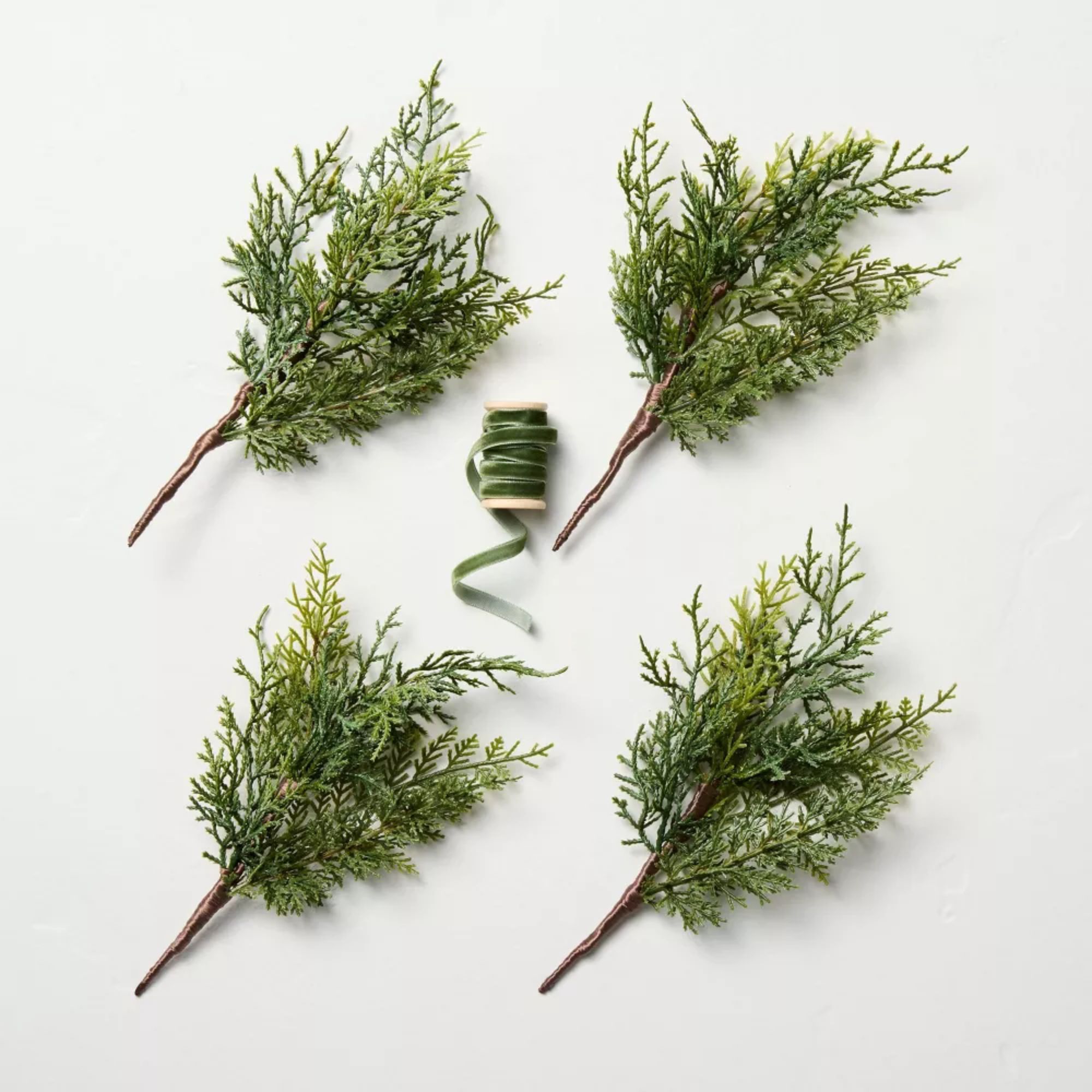 Faux pine sprig gift topper with green velvet ribbon