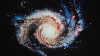 A photo of a projection of the Whirlpool Galaxy