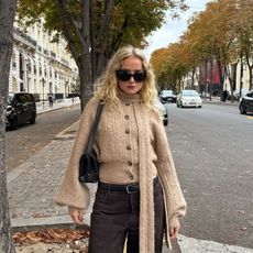 Influencer wearing scarf coat
