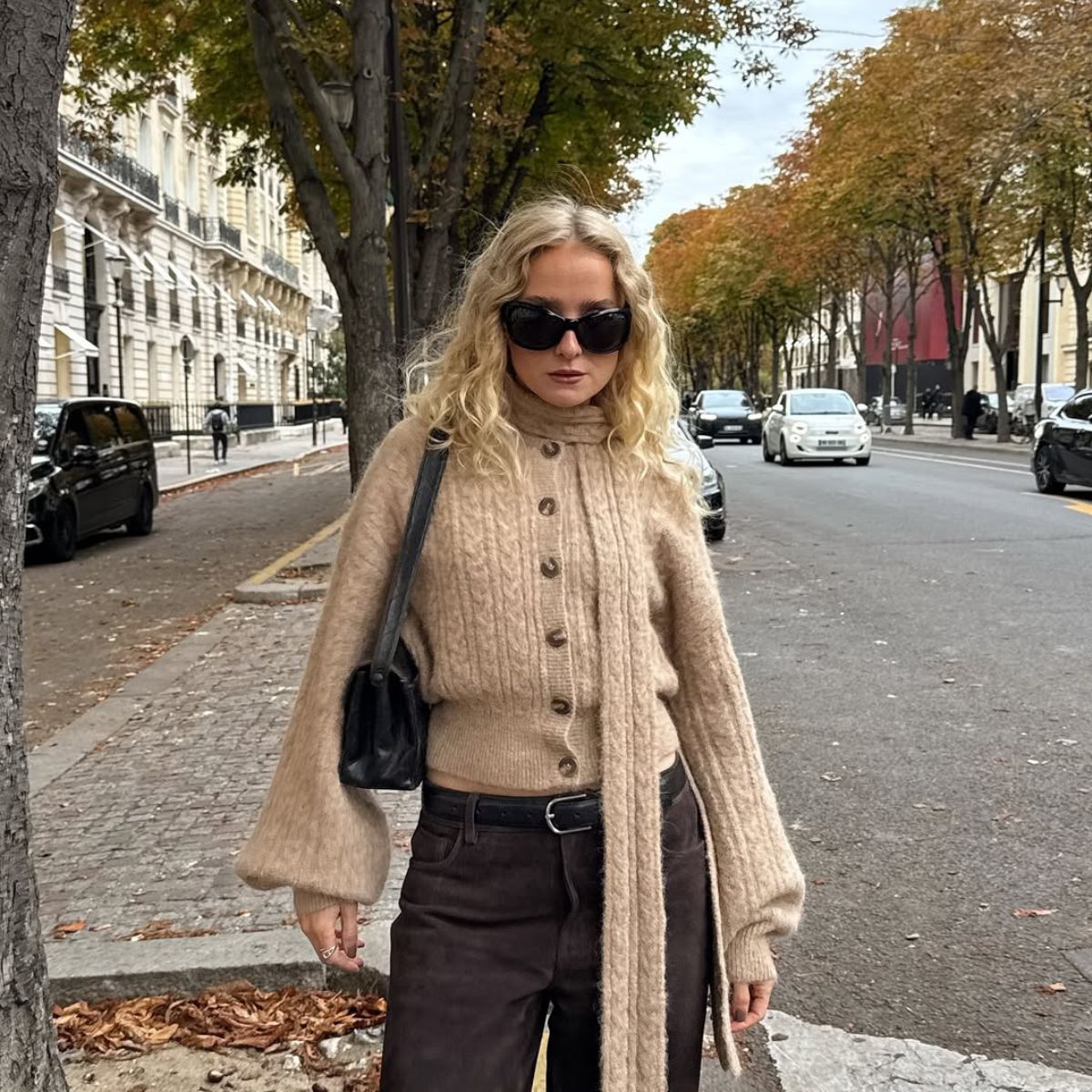 Influencer wearing scarf coat