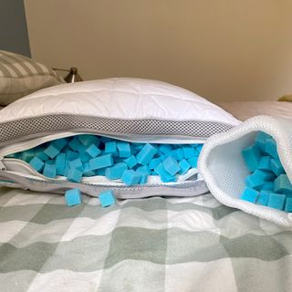 The Simba Hybrid pillow unzipped to show the blue foam cubes inside it