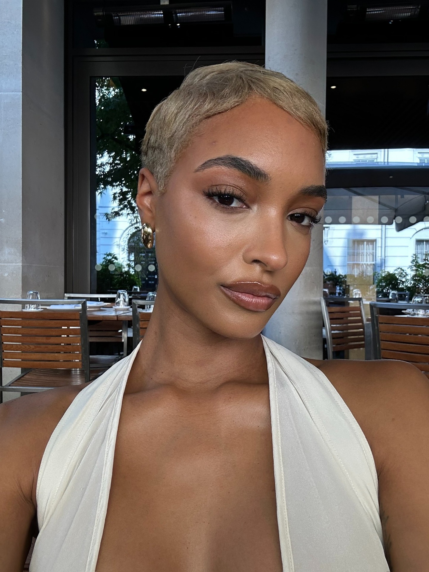 Jourdan Dunn with a blonde pixie hairstyle
