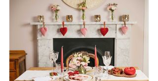 valentine's day decorations on a fireplace and dining table