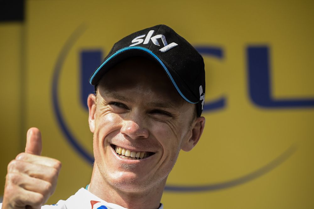 Chris Froome was all smiles on the podium following stage 14.