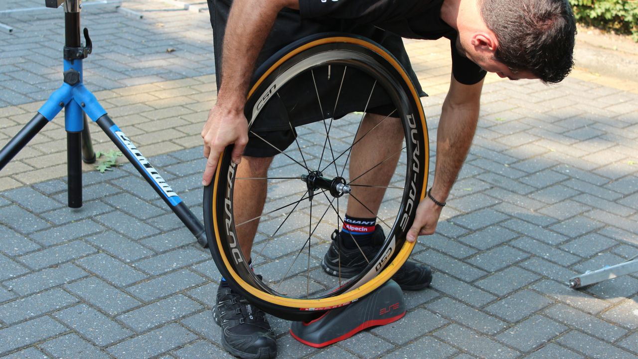 Mounting tubulars sticky with wet glue is not as easy as pro mechanics make it look (