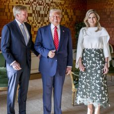 King Willem-Alexander, Donald Trump and Queen Maxima posing at Paleis Huis ten Bosch 
