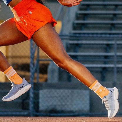 model wearing free people running socks