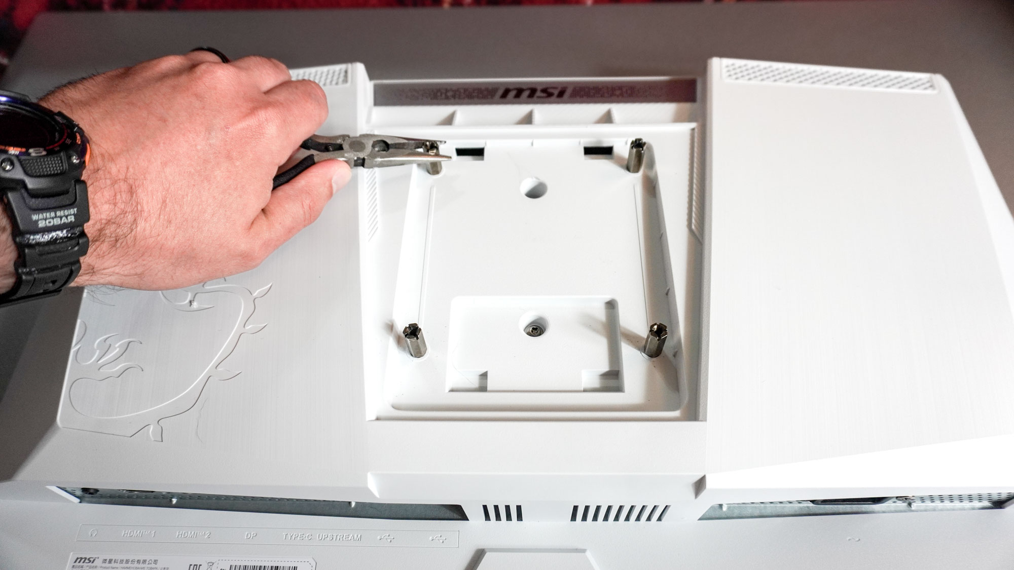 Installing standoffs in the VESA holes on the back of the MSI MPG 321URXW QD-OLED monitor