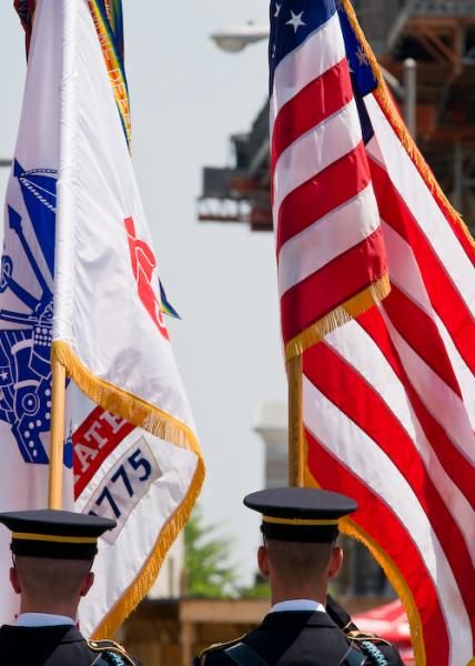 The Color Guard flies our flags during the National Anthem.