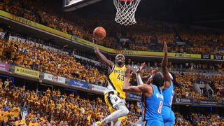 NBA Finals game 6 as Pascal Siakim dunks the ball against the Thunder