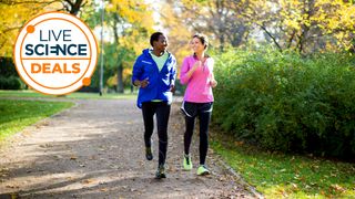 A Live Science logo and a picture of a young couple running through a park in spring bloom