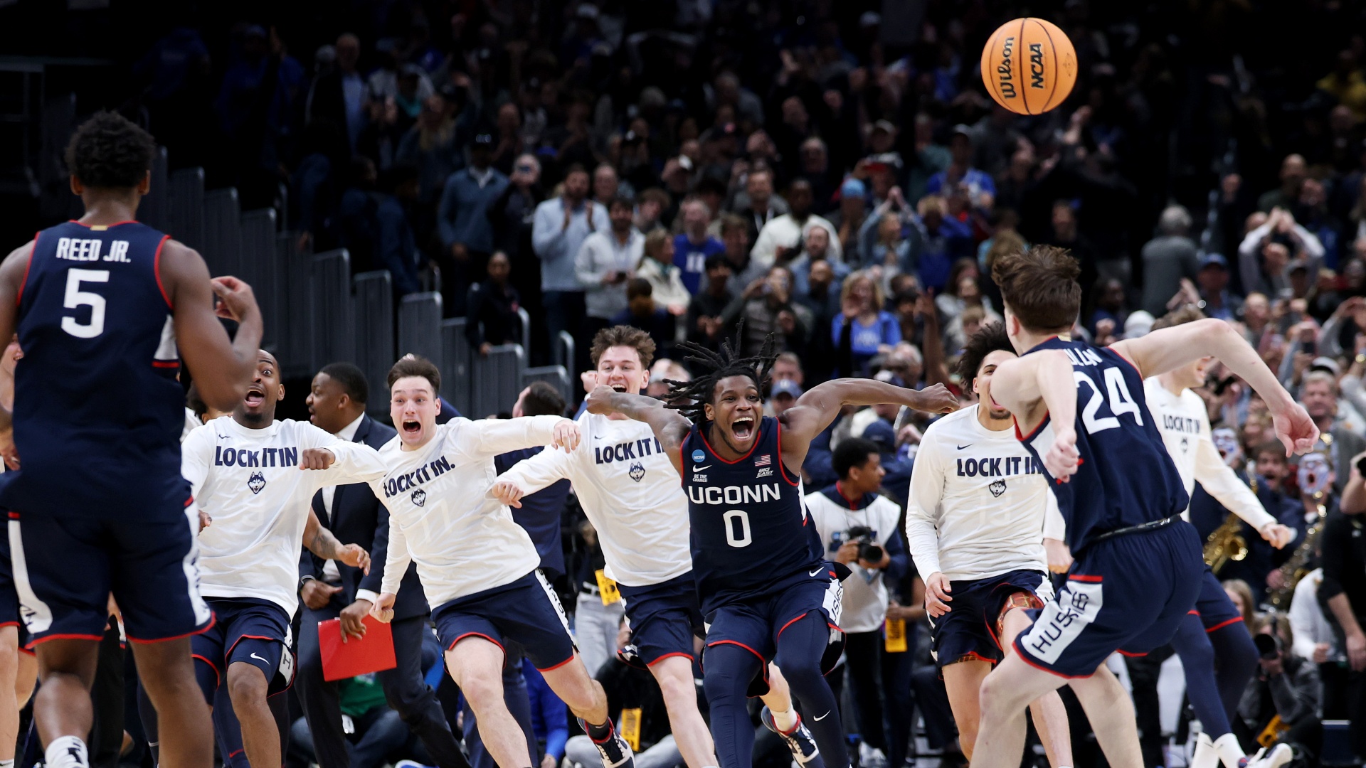 The UConn Huskies' Braylon Mullins and Malachi Smith celebrating at March Madness 2026