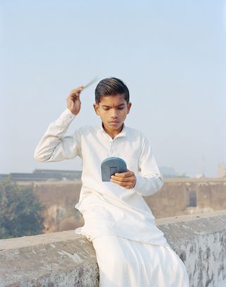 ‘Rama Combing His Hair’, Ayodhya, Uttar Pradesh, India, 2015, from the series A Myth of Two Souls