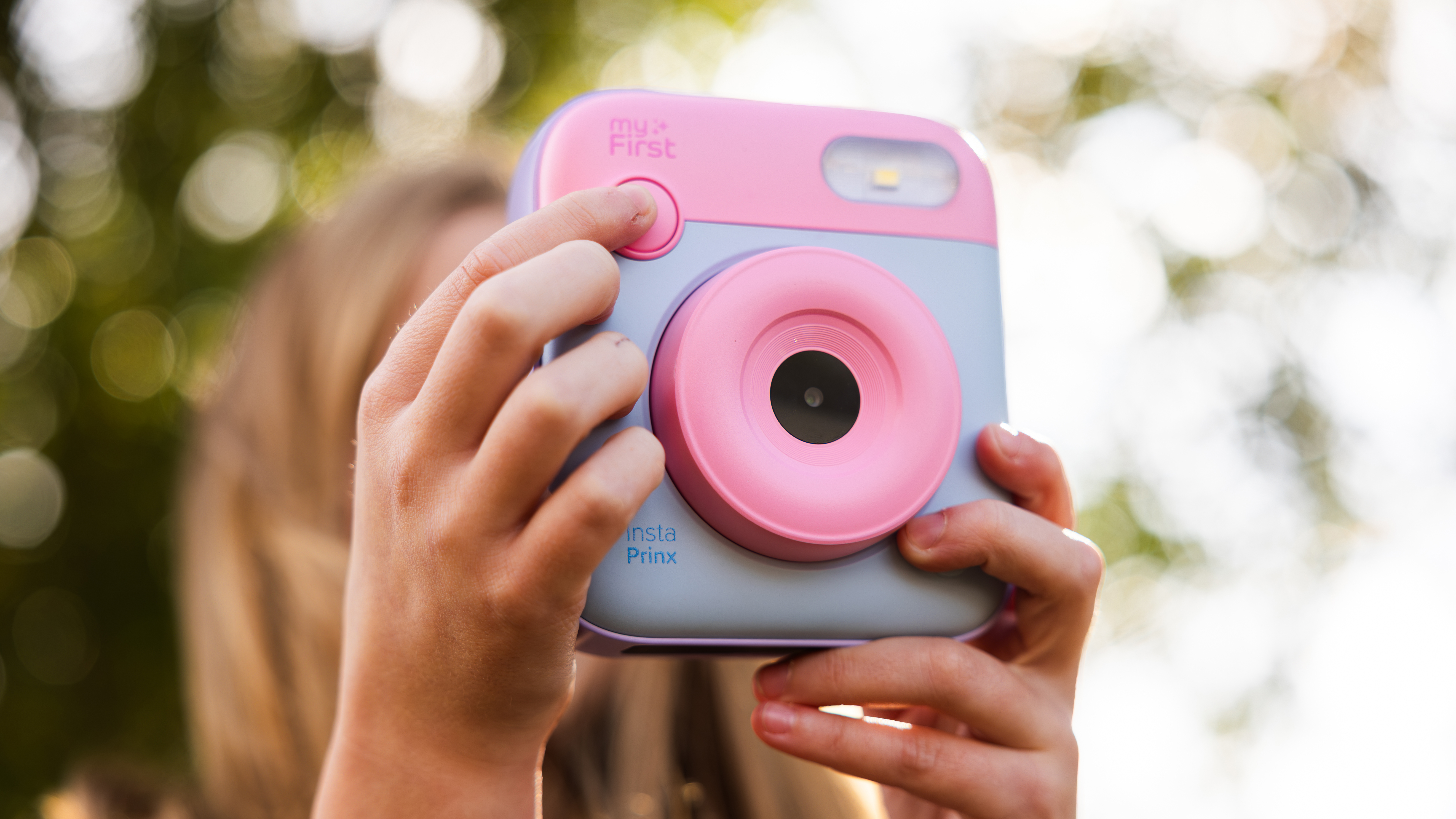 The myFirst Camera Insta Printx in a child&#039;s hands