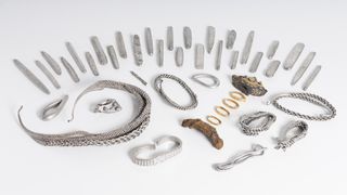 An image of silver and gold artifacts from the Bedale hoard