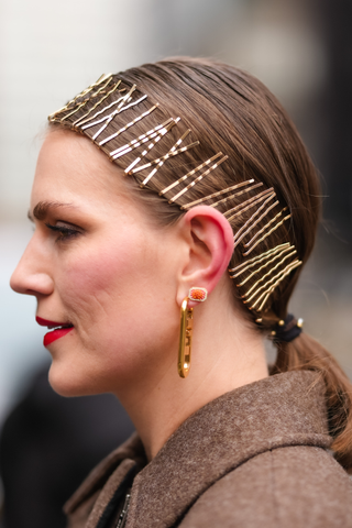 Woman at NYFW wearing hair accessories beauty