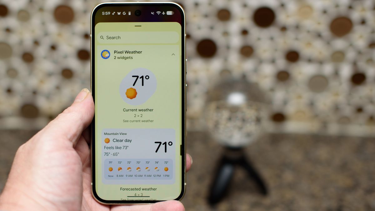 Google Pixel 10 in Lemongrass against a bubbly backsplash