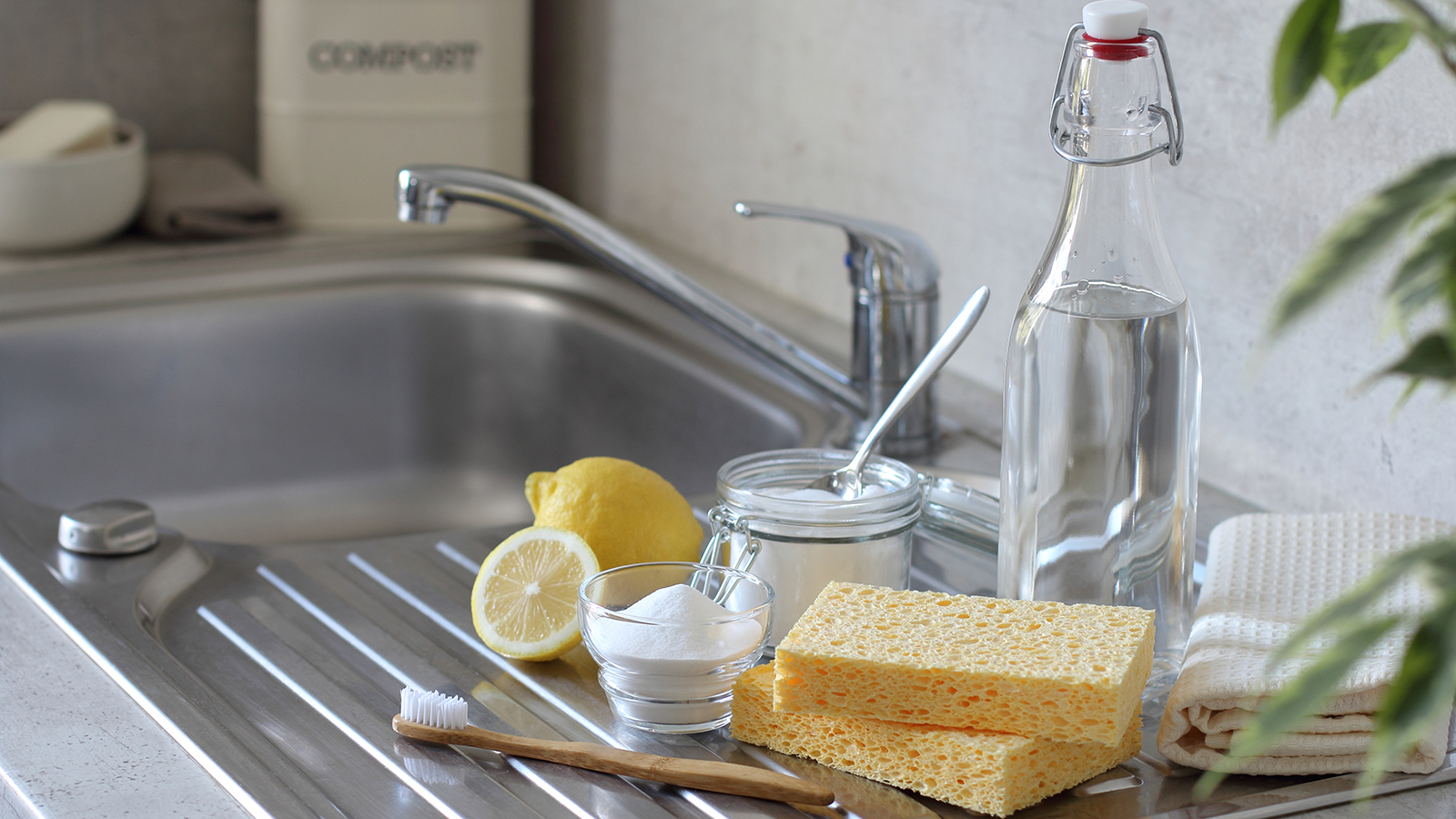 Natural cleaning supplies including baking soda and lemon