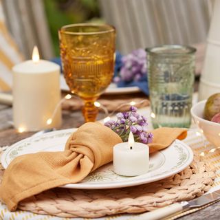 dining table with plate with LED votive 