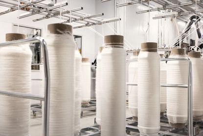 Rolls of Spinnova fibre in factory
