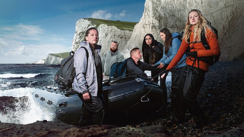 Pulling a boat up onto a beach in a scene from Channel 4 TV show Go Back To Where You Came From