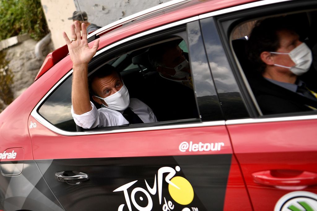 French President Emmanuel Macron L sits in a car next to former rider and current ASO sporting manager Franois Lemarchand unseen as he spends a day on the Tour de France during the 17th stage of the 107th edition of the Tour de France cycling race 170 km between Grenoble and Meribel on September 16 2020 Photo by AnneChristine POUJOULAT AFP Photo by ANNECHRISTINE POUJOULATAFP via Getty Images