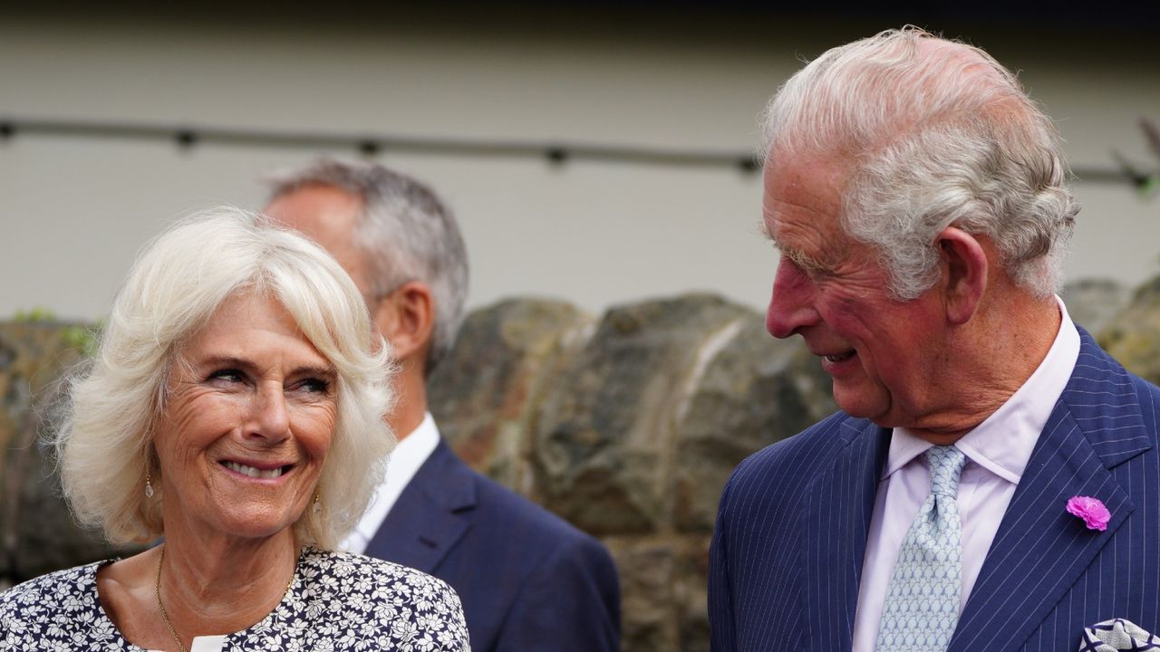 LLANTRISANT, WALES - JULY 07: Prince Charles, Prince of Wales and Camilla, Duchess of Cornwall during a visit to the newly restored Llantrisant Guildhall Heritage and Visitors&#039; Centre in Llantrisant, Glamorgan, as part of a week long tour of Wales for Wales Week, on July 7, 2021 in Llantrisant, Wales. (Photo by Ben Birchall - WPA Pool/Getty Images)